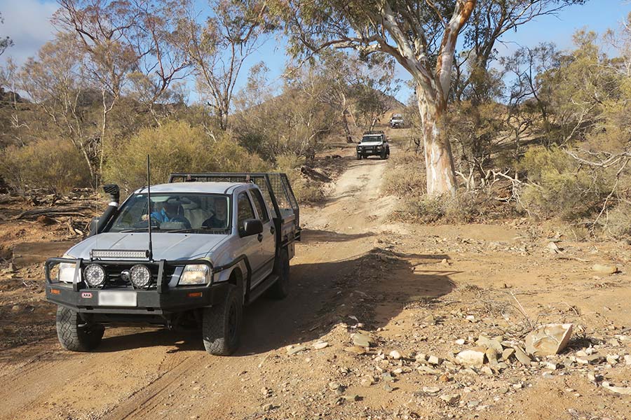 4WD crossing a dry creek bed on the Caernarvon Track
