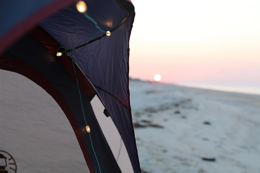 Biolite string lights hanging on a tent