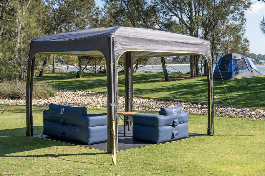 Ben and Lauren sit down with co-founder Chris, unpacking the Quest Outdoors' meteoric rise from industry outsiders to outdoor living experts. A Quest Outdoors gazebo, camp table, and two inflatable couches.