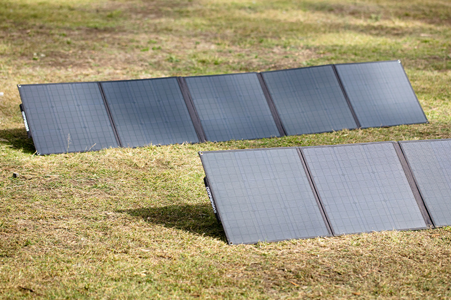 A set of solar panels on the lawn. 